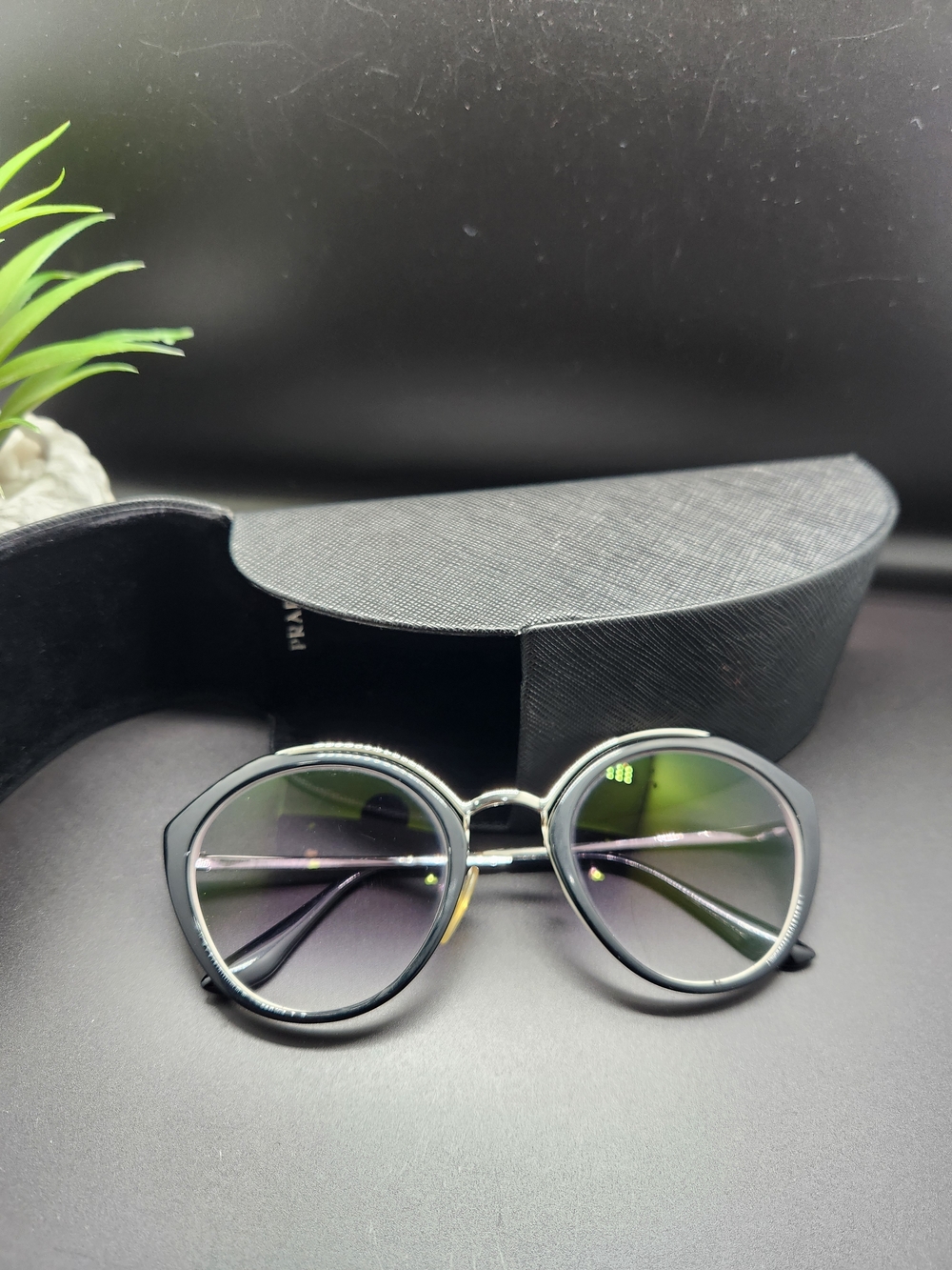 Prada Black Frame Sunglasses with Smokey-Tinted Lenses